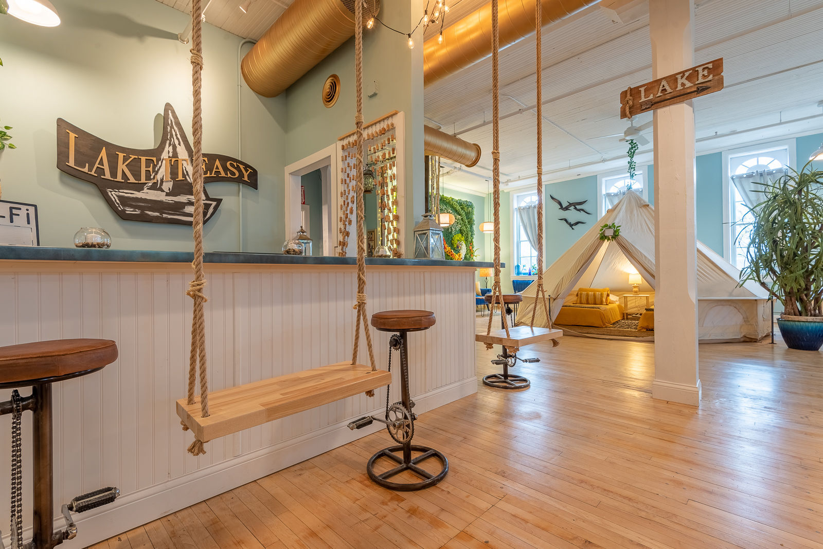 Keefe Vacation Rental's new "glamping" lodging facility includes a bar with swings as barstools
